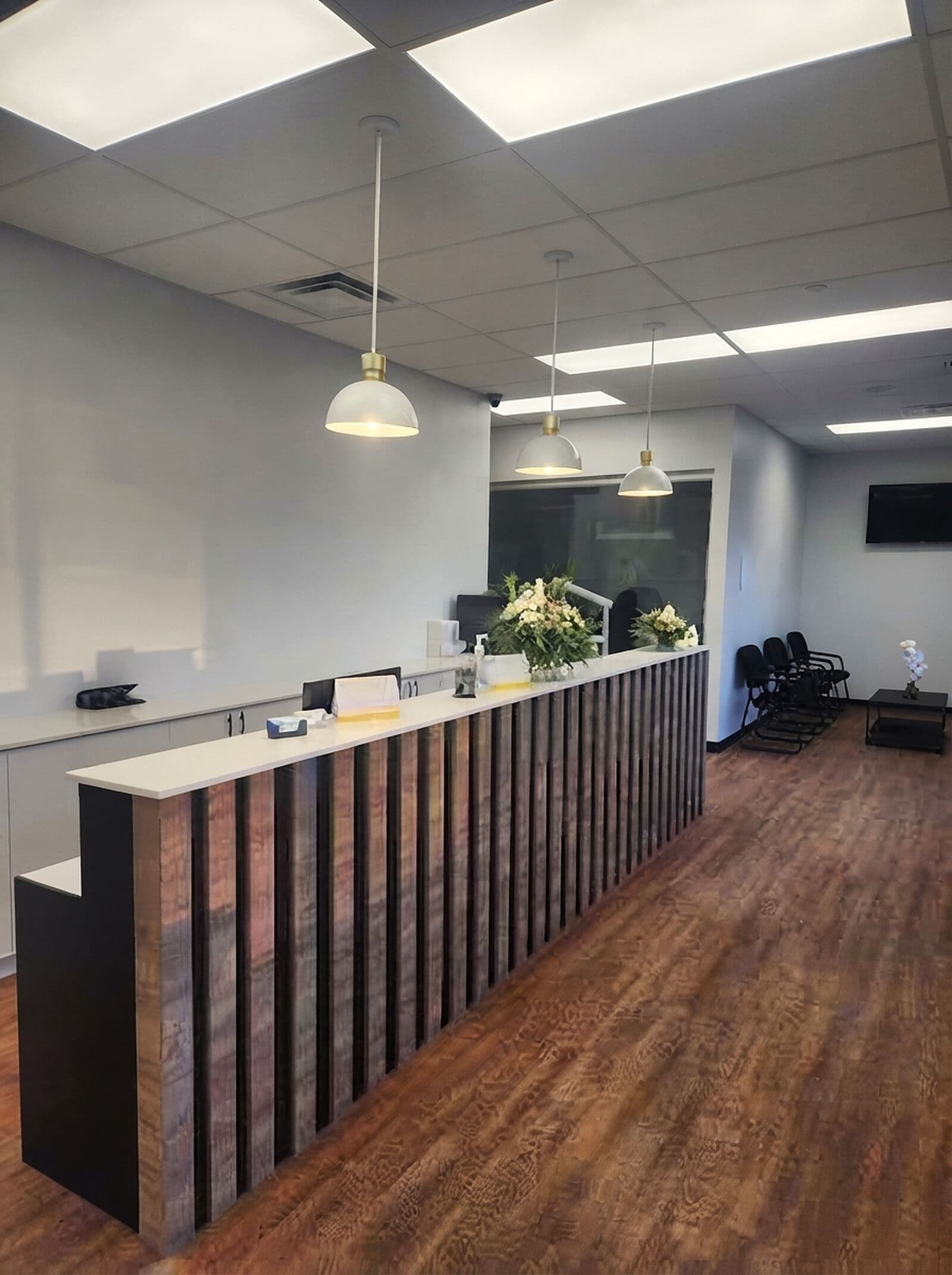 Front reception desk and check-in area at Riverside Landing Dental in St. Albert